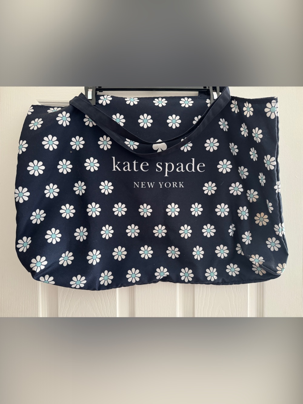 kate spade navy tote with white daisy print